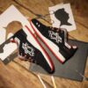 Asics x titolo